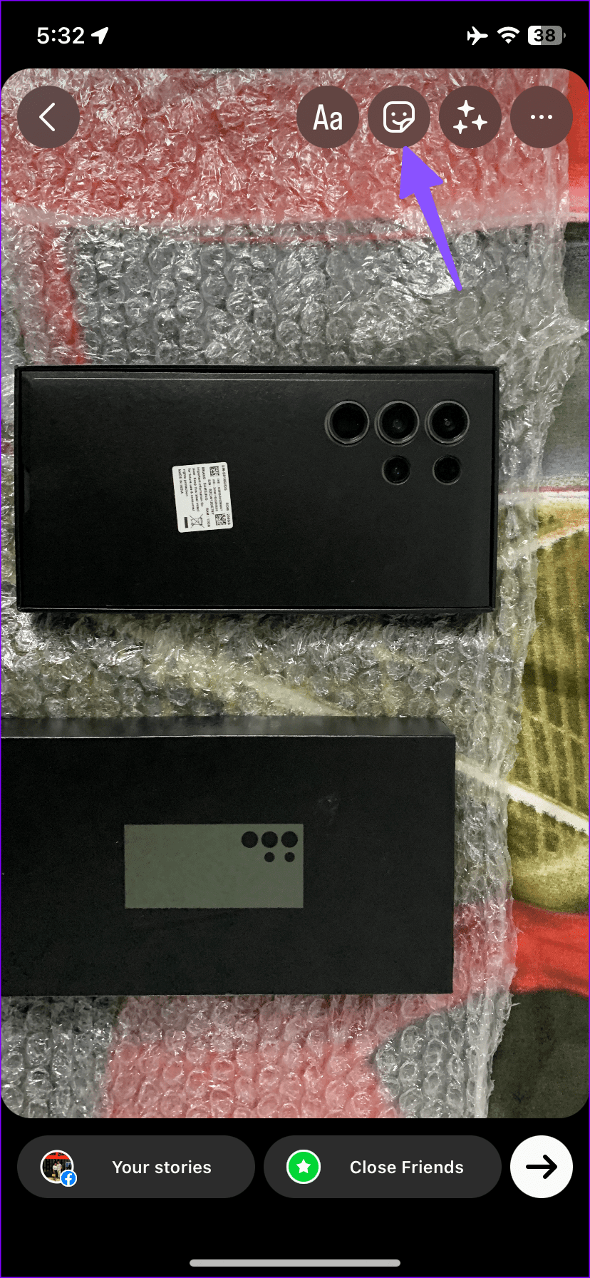 Tap on Stiicker icon