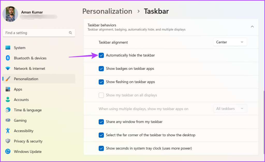 Check Automatically hide the taskbar option in Settings